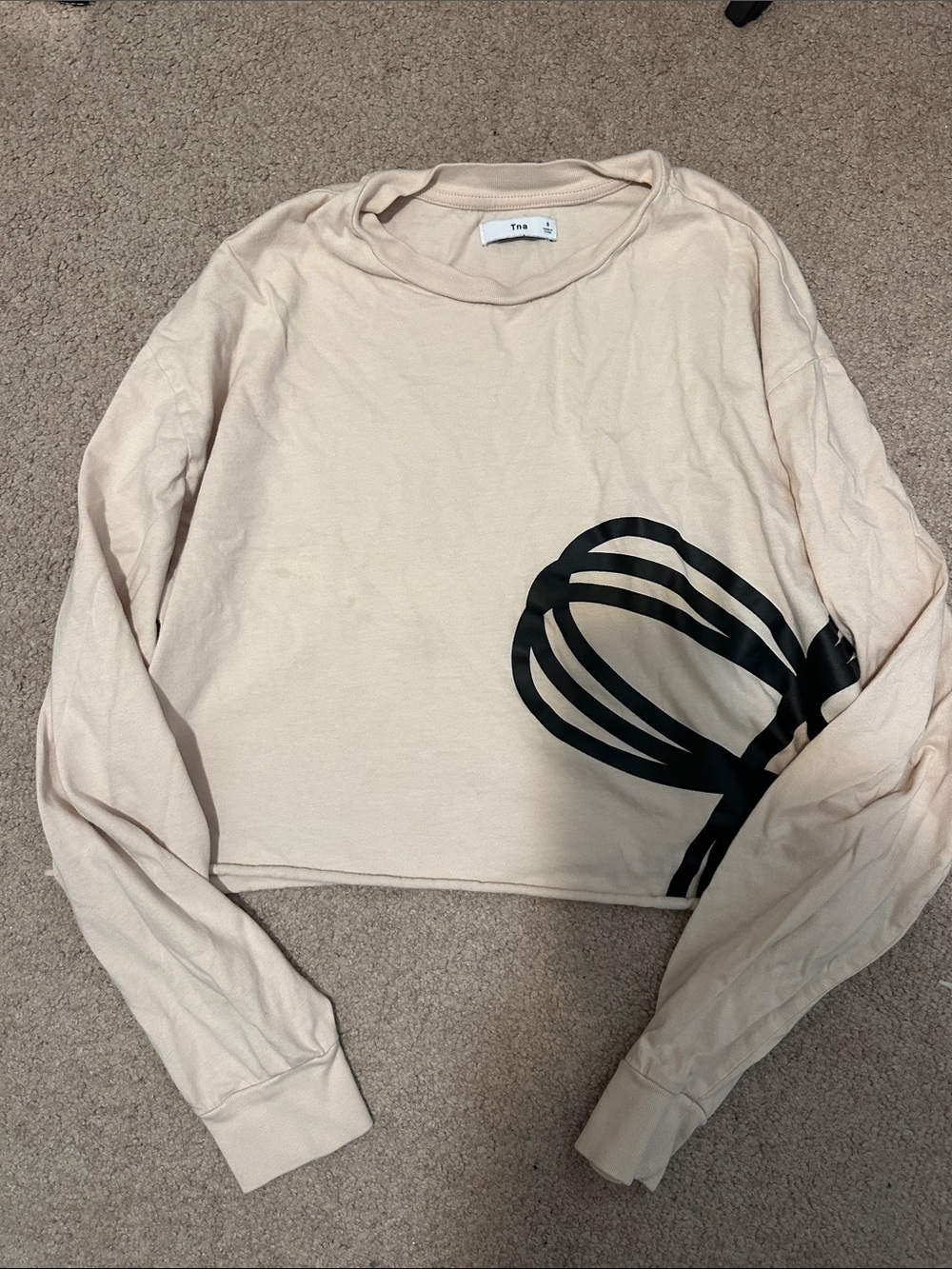 TNA Cream Cropped Long-Sleeve Top with Black Graphic